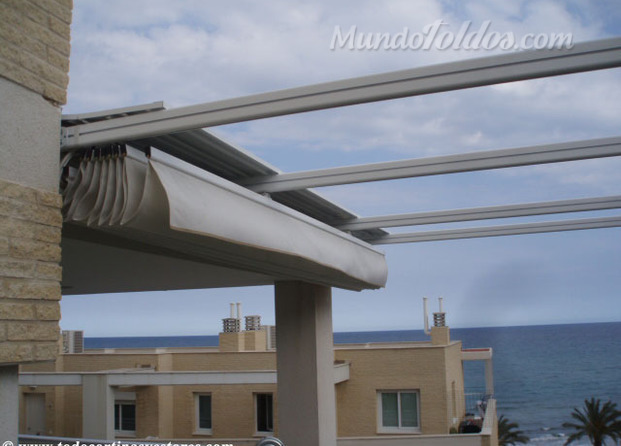 TOLDO VERTICAL DROP CON CREMALLERA - Turisol Decorlux